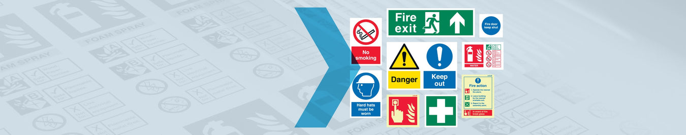 Assorted safety signs including fire exit, danger, and no smoking on a faded backdrop